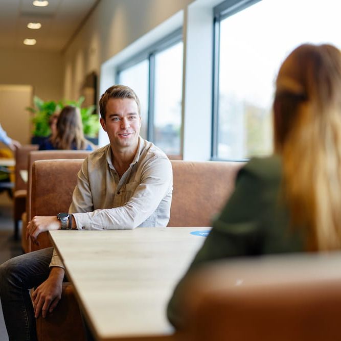 demcon-colleagues-talking-dtc