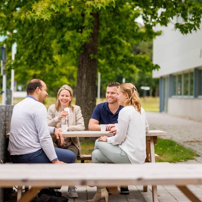 demcon-colleagues-talking-outside