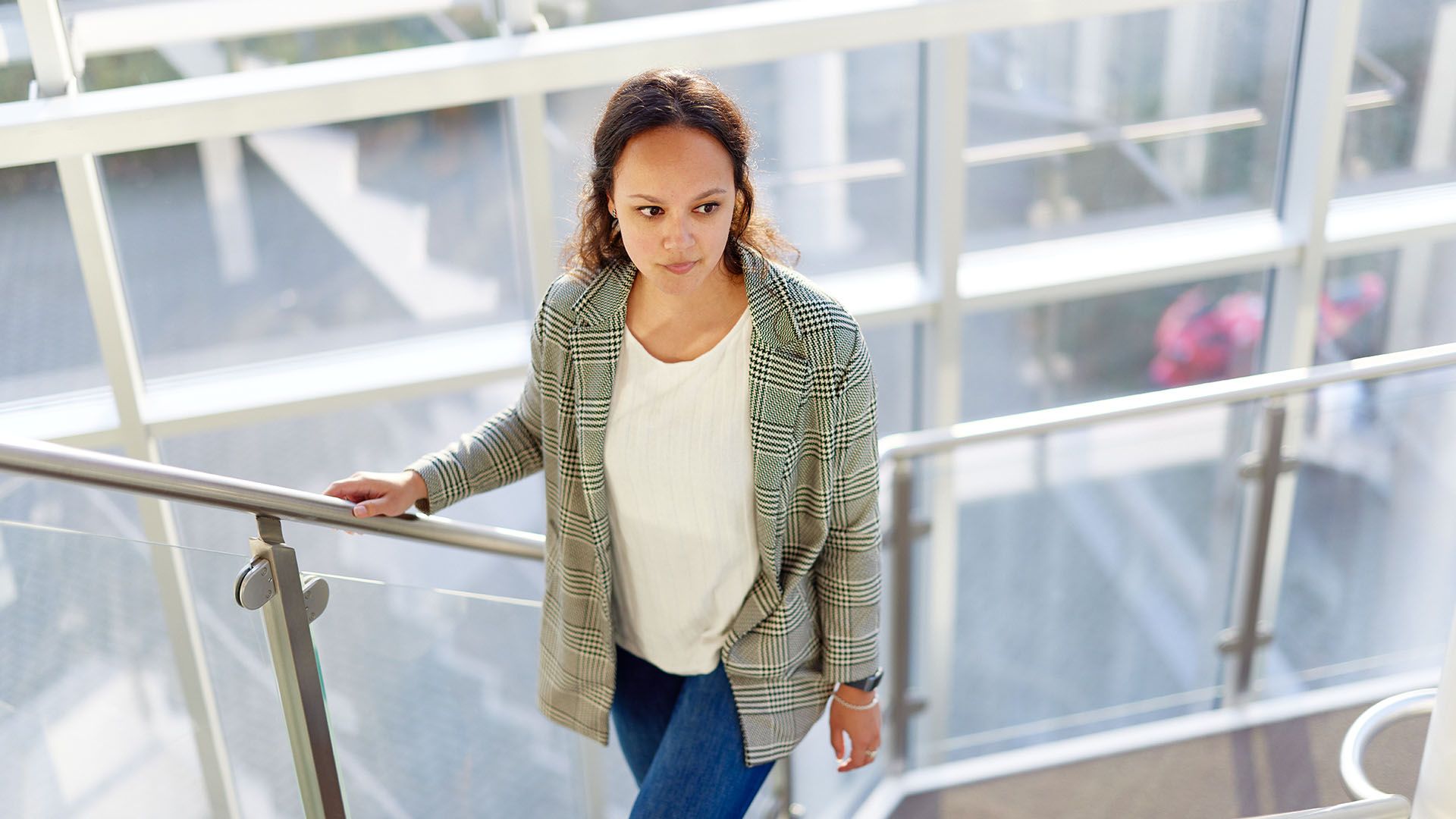 female engineer walking up stairs